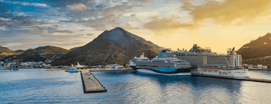 Cruise ships in Saint Martin harbor at sunset